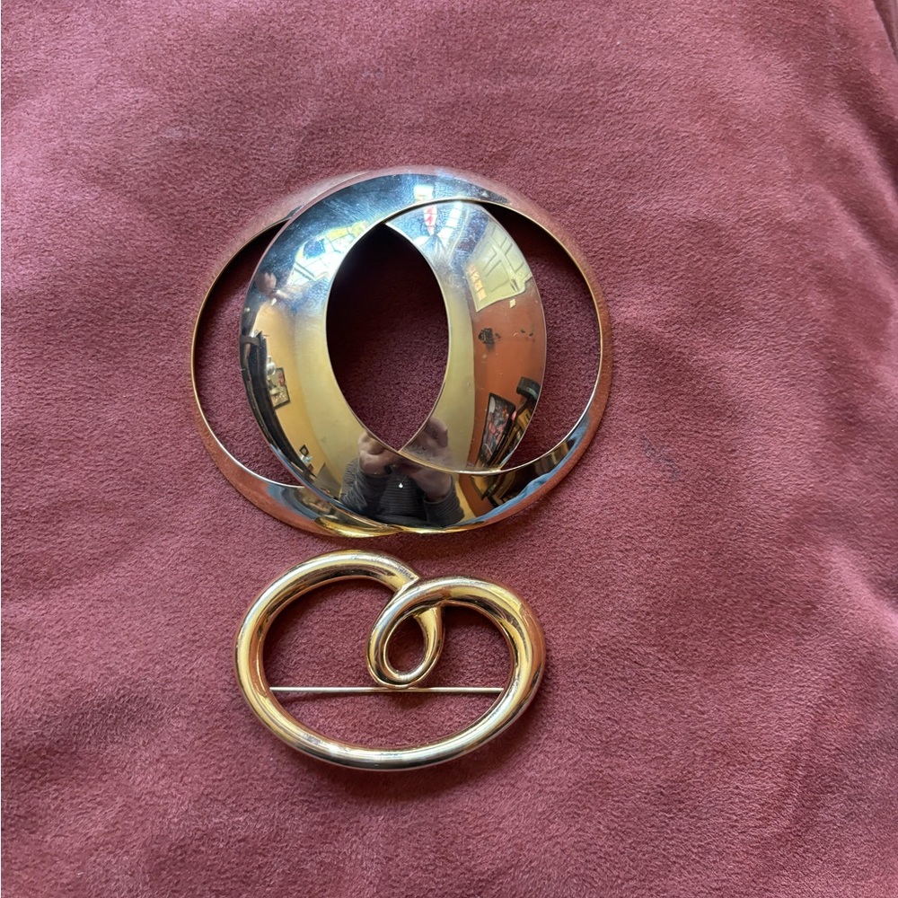 Golden brooches